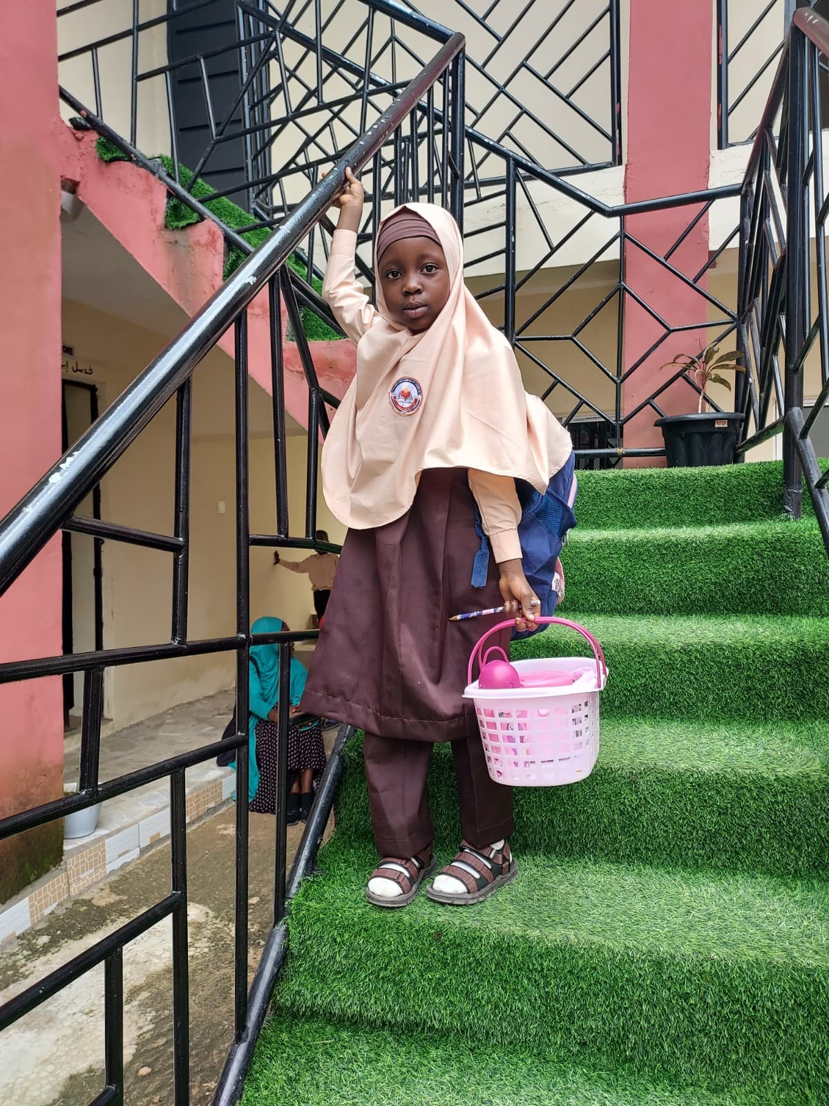 Female pupil on the staircase